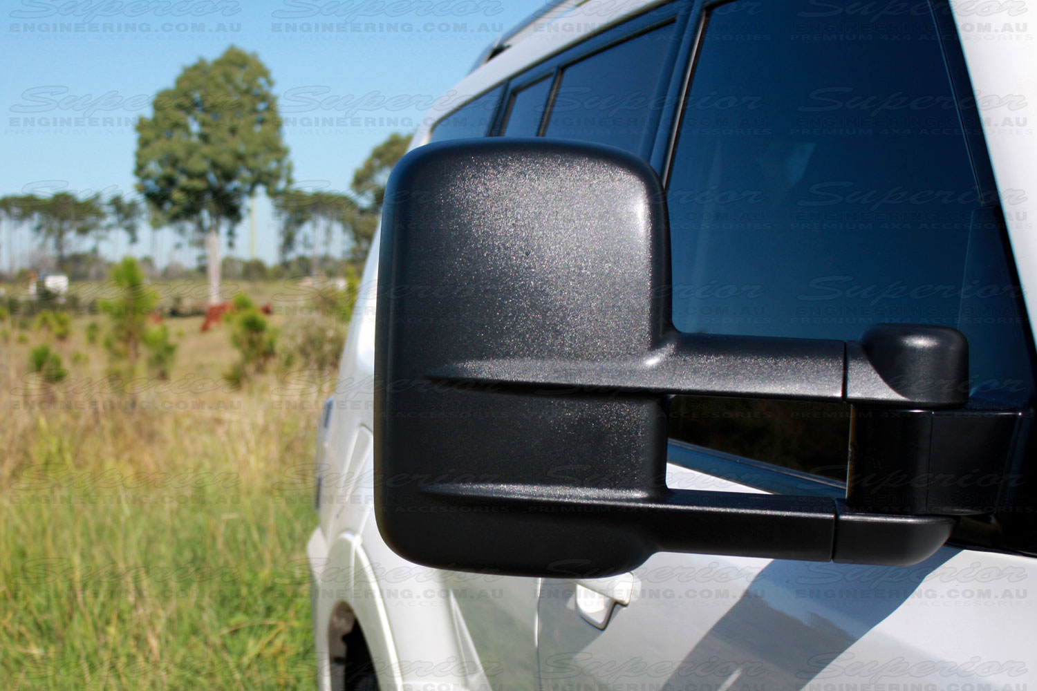 Right front view of a black Mitsubishi Pajero Clearview Towing Mirror