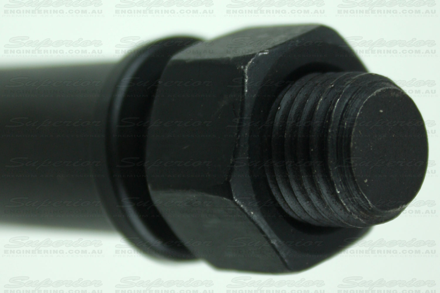 Closeup view of the main nut and washer on the fixed pin