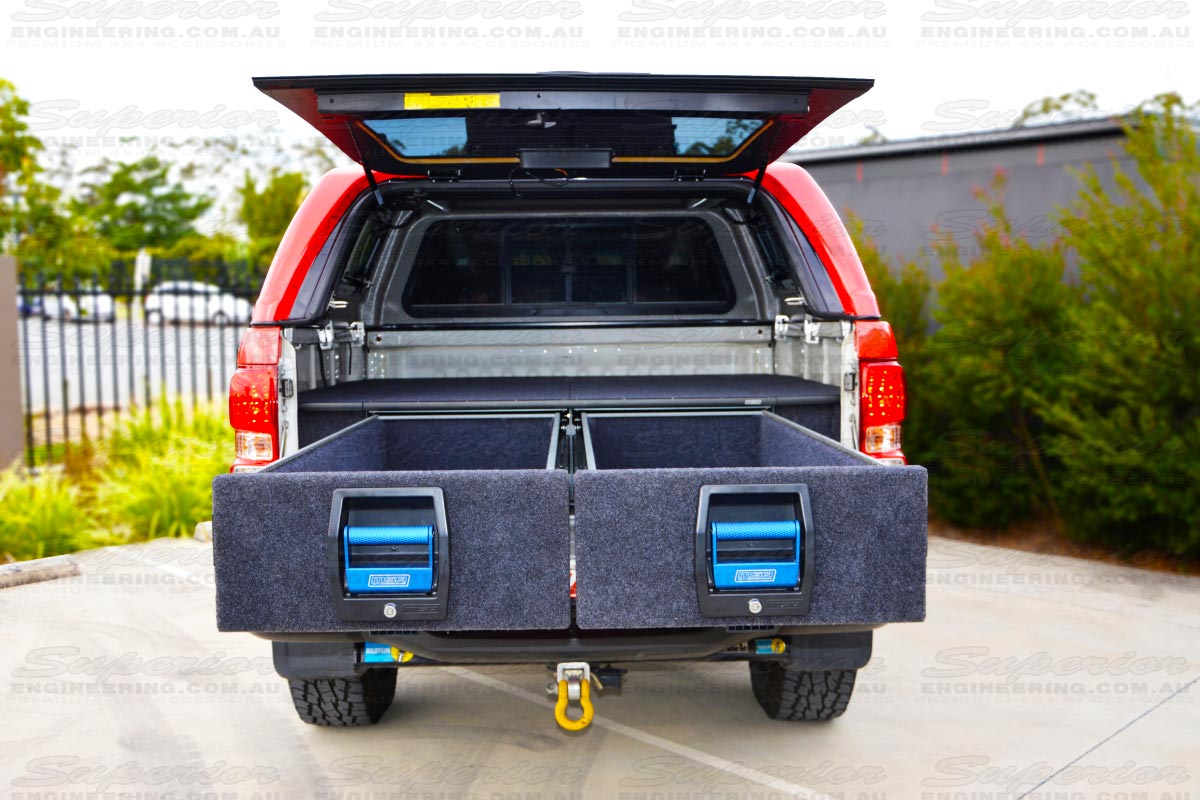 Rear view of the Holden Colorado with the MSA 4x4 Drawer System fitted with both drawers open showing the storage area, handles and carpet area