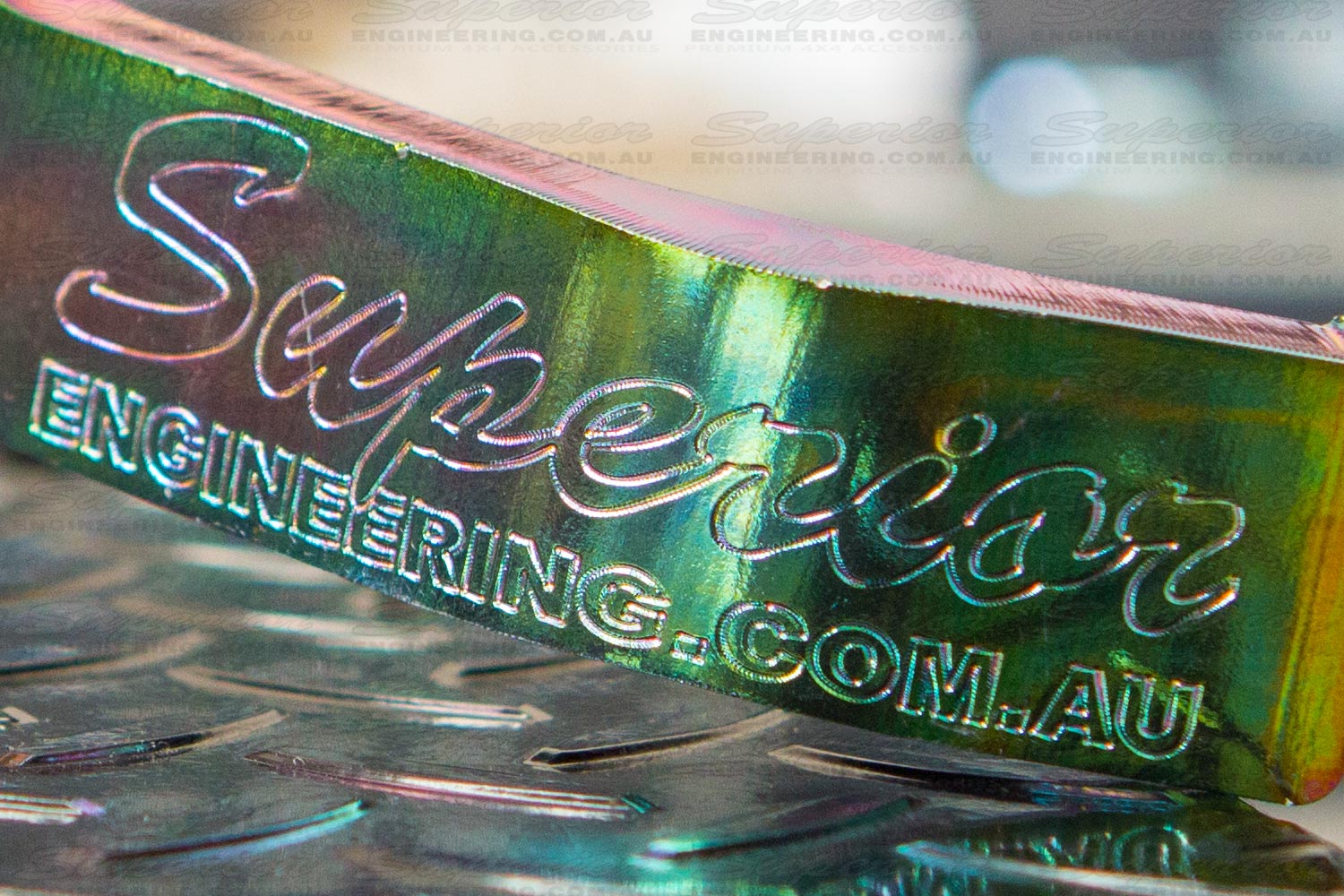 Closeup view of the Superior Engineering logo engraved onto the face of the Coil Retainer